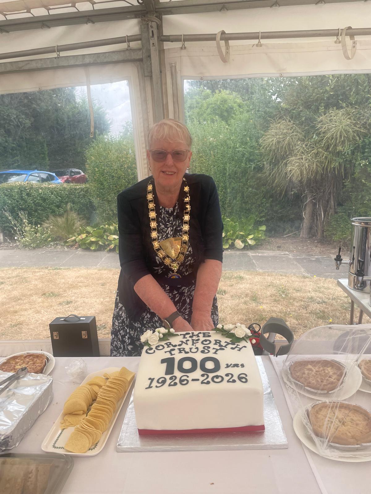 cutting the cake for 100 years